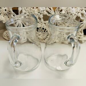 Pitchers, thick, heavy glass. Made in Italy. Mint condition. Holds 0.25L.